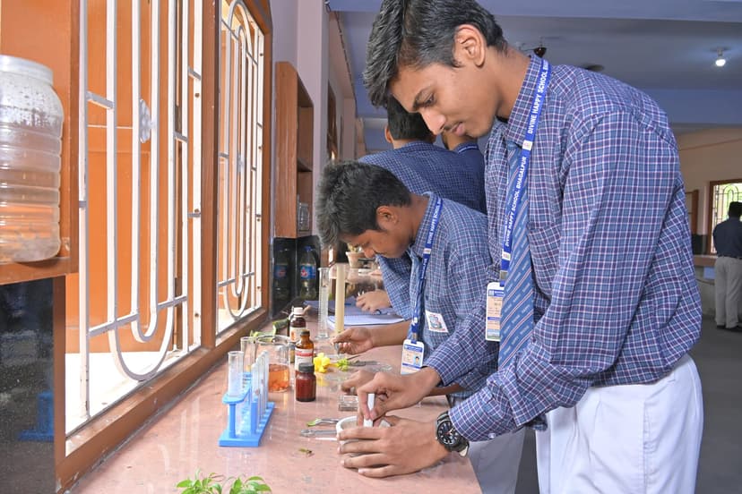 Teacher with students outdoors